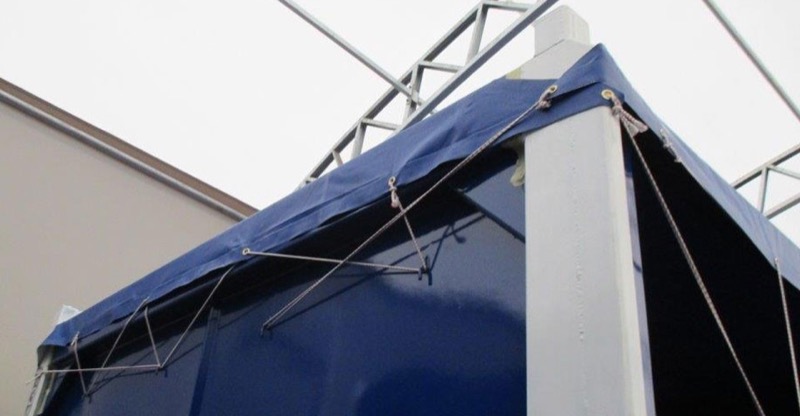 tarp-on-offshore-mini-container